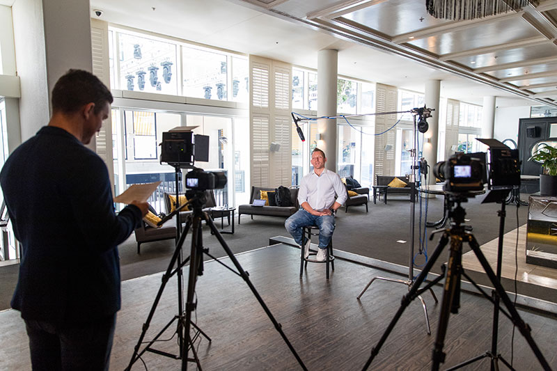 behind the scenes filming a corporate video with sydney corporate photography and video