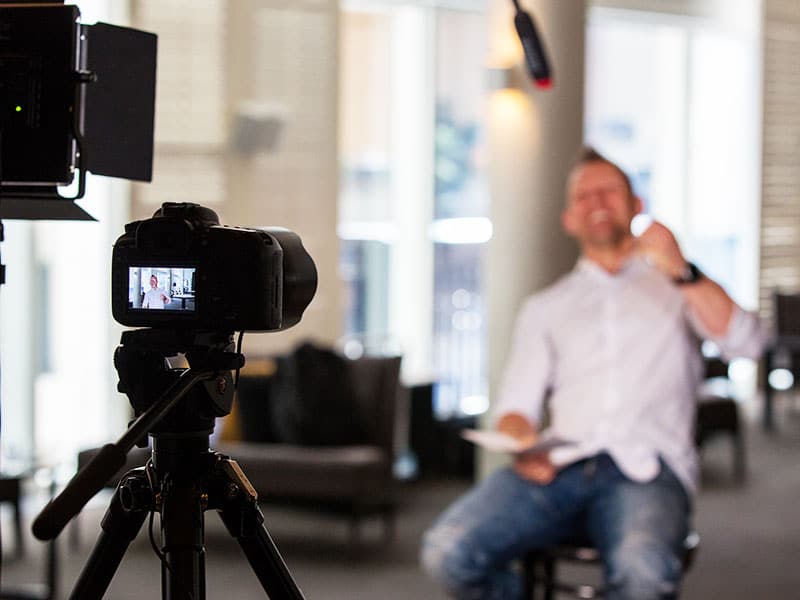 behind the scenes filming a corporate video with sydney corporate photography and video